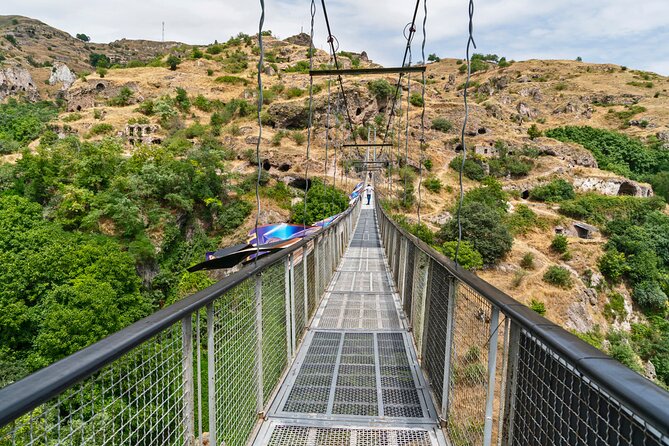 Group Tour: Hin Areni Winery, Tatev (wayback on Ropeway), Khndzoresk Caves - Khndzoresk Caves: Stone Carpets, Survival History, and a Swinging Bridge