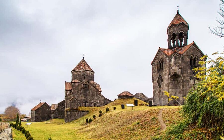 Haghpat, Sanahin & Odzun, Mendz Er or Zarni - Parni Caves - Stop 6, Odzun Monastery: a domed basilica made from pink felsite