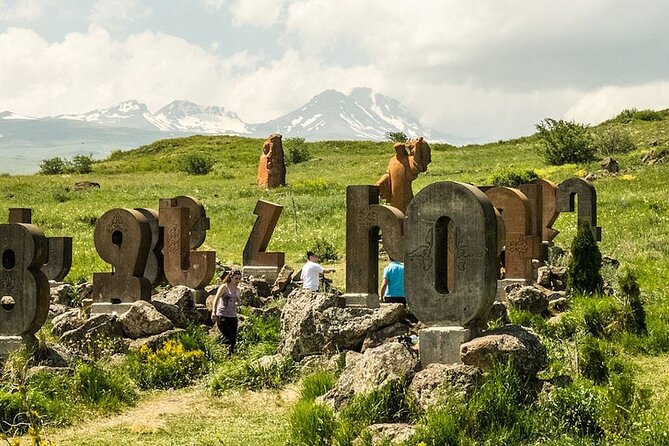 Mount Aragats,Amberd Fortress,Alphabet Monument, Saghmosavank - The Armenian Alphabet Monument and Mesrop Mashtots, with Mount Aragats in the background