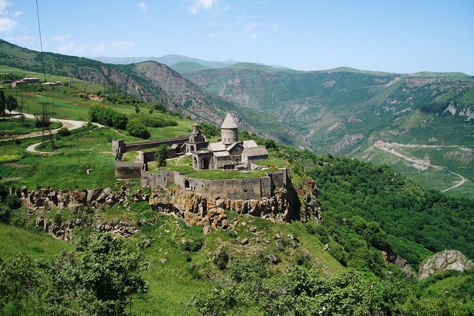 Private tour to Hin Areni winery, Tatev monastery & ropeway, Khndzoresk caves - Stop 4: Khndzoresk Caves, Swinging Bridge, and the Canyon People Built